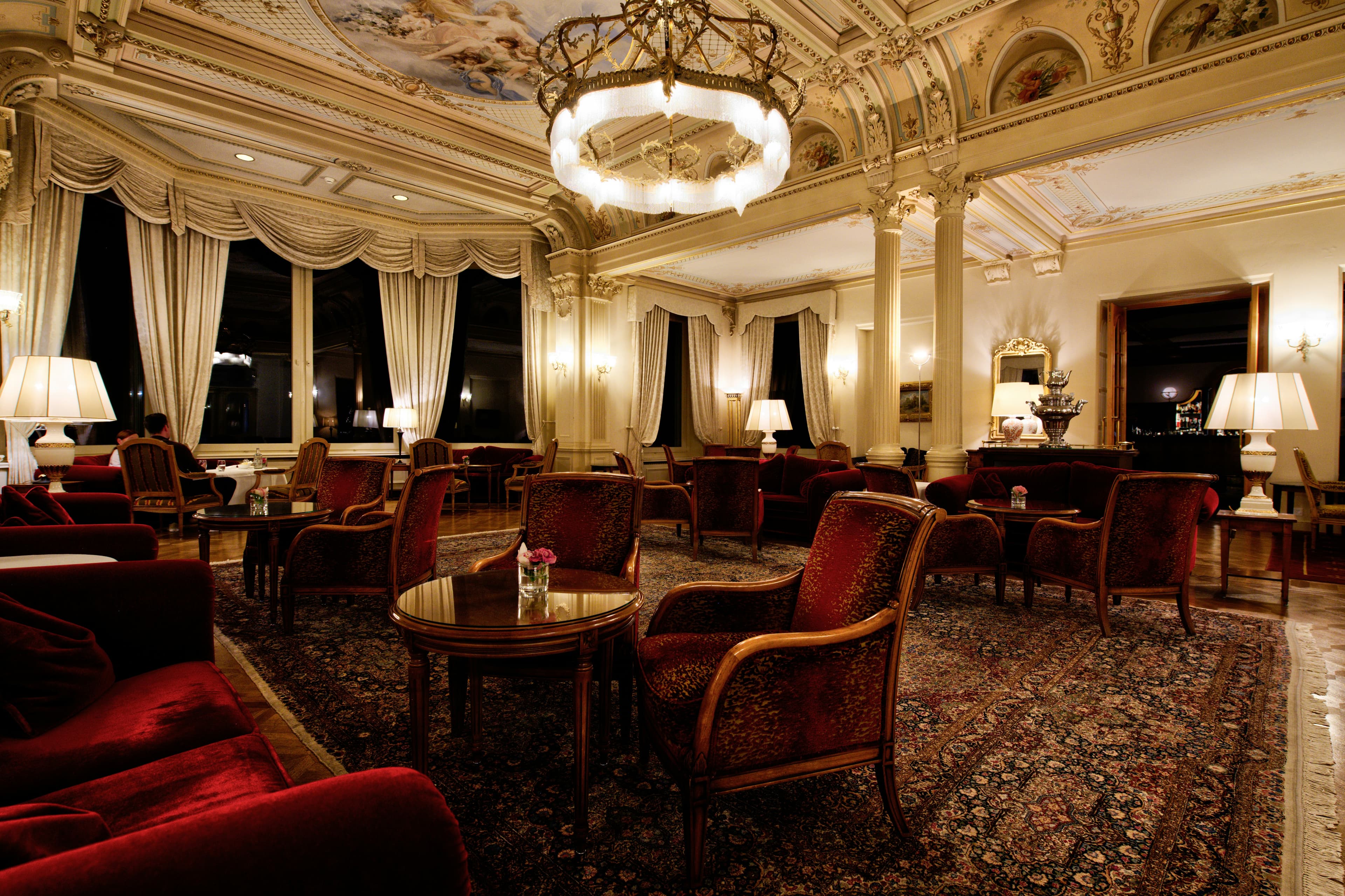 Hotel bar interior at night with warm Edison-bulb lighting